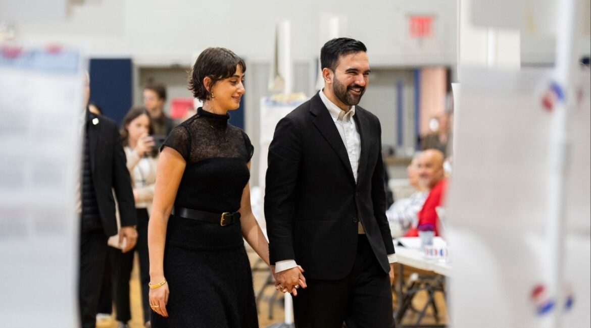 State Assemblyman Zohran Mamdani, the Democratic nominee for mayor, and his wife, Rama Duwaji, arrive to cast their ballots at a polling place in Queens on Tuesday morning, Nov. 4, 2025. Mamdani told his wife months ago of his doubts of winning the mayoralty. (Amir Hamja/The New York Times)