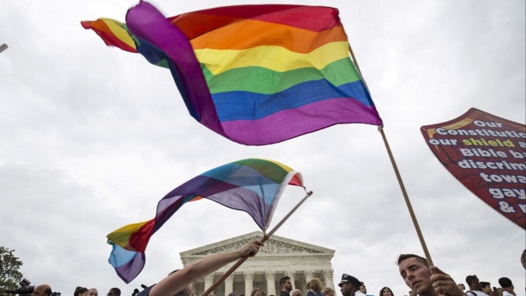 Supporters of gay marriage wave the rainbow flag after the U.S. Supreme Court ruled on Friday that the U.S. Constitution provides same-sex couples the right to marry at the Supreme Court in Washington June 26, 2015. (Reuters File)