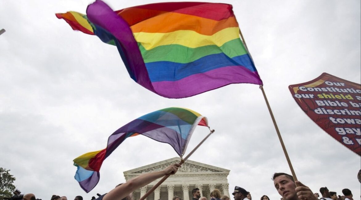 Supporters of gay marriage wave the rainbow flag after the U.S. Supreme Court ruled on Friday that the U.S. Constitution provides same-sex couples the right to marry at the Supreme Court in Washington June 26, 2015. (Reuters File)