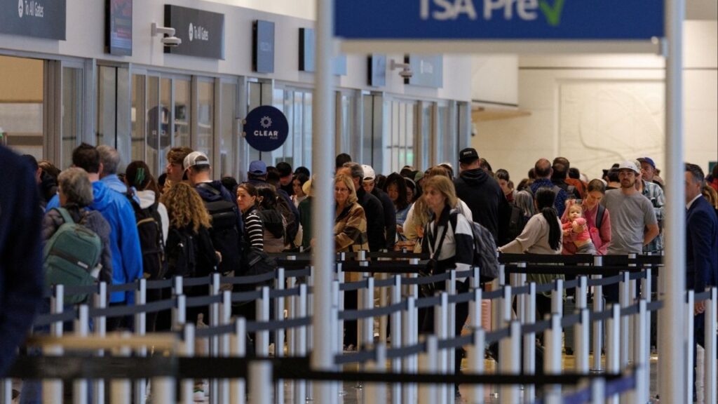 Travelers wait to clear security at San Diego International Airport after U.S. Department of Transportation, due to the ongoing government shutdown, imposed a 10% cutback on flight capacity at selected airports that include the country's busiest one-runway airport in San Diego, California, U.S., November 7, 2025. (Reuters/Mike Blake)