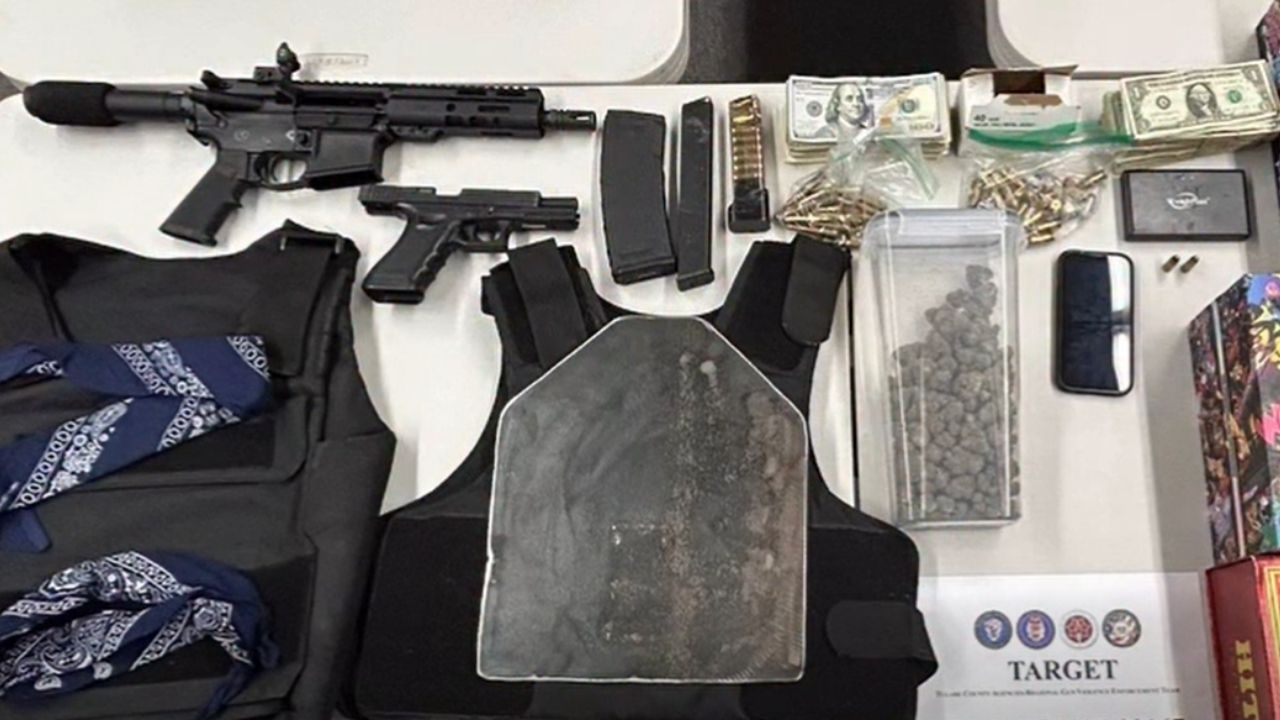 Two men were arrested Wednesday, Nov. 19, 2025, after Visalia police and a regional gun violence team seized firearms, drugs, ammunition, cash and body armor during a search of a home on East Mineral King Avenue. (Visalia PD)