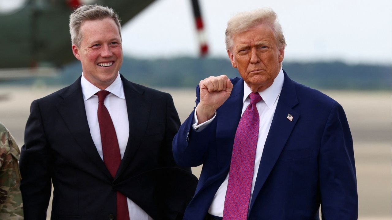 U.S. President Donald Trump pumps a fist next to U.S. Army Secretary Daniel Driscoll, upon arrival at Pope Army Airfield, North Carolina, U.S., June 10, 2025. (Reuters/Evelyn Hockstein)