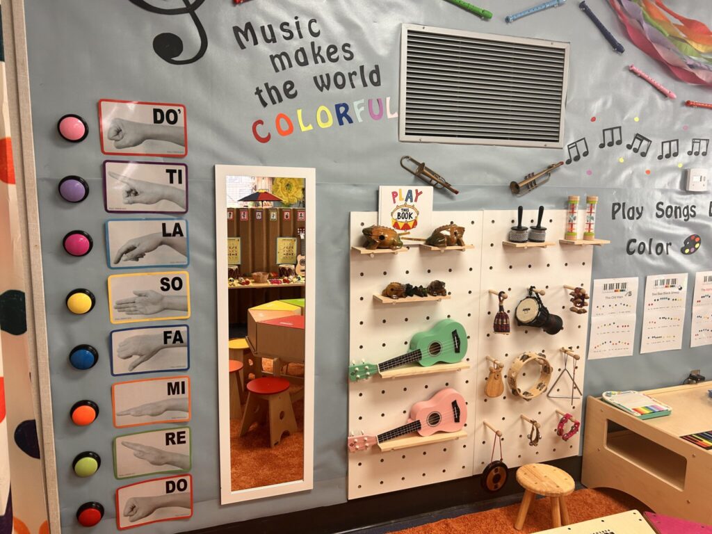 “Do, Re, Mi, Fa, So, La, Ti, Do” line the wall in Clovis Unified’s preschool exhibit. Students can press a button to hear each sound and sing along in the mirror.