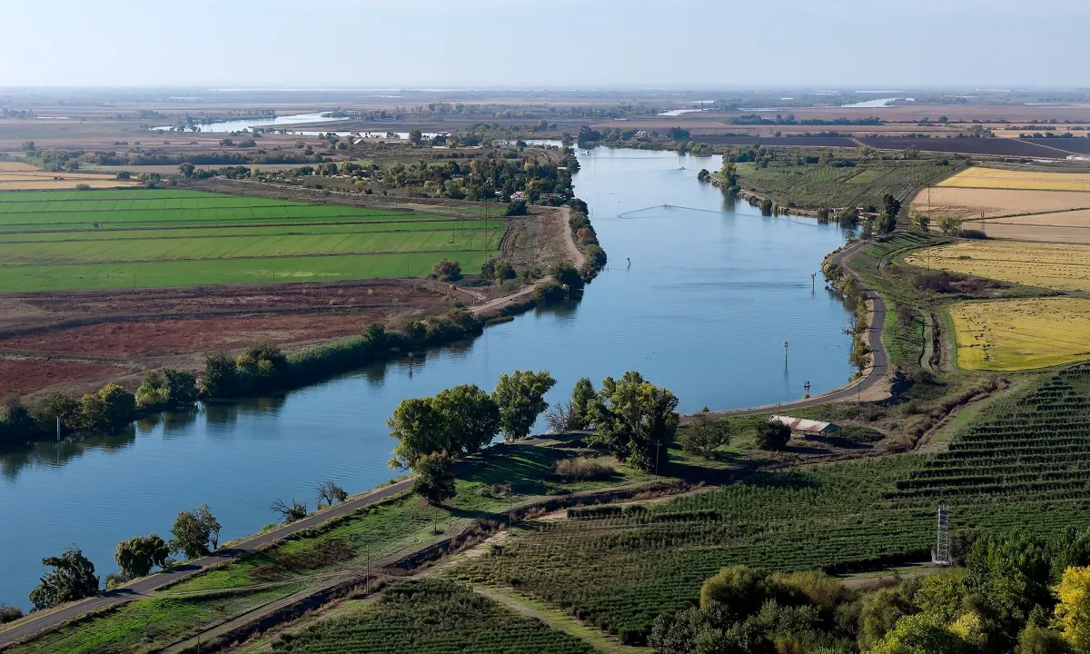 Aerial view of the San Joaquin River flowing through farm fields near Stockton, California