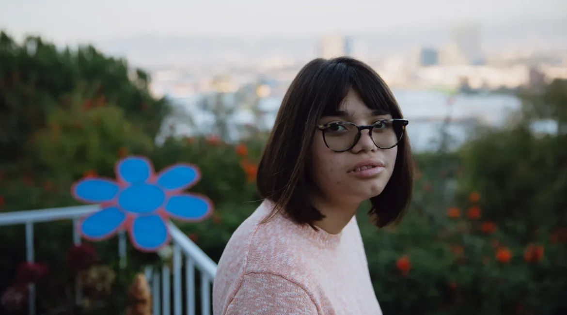 Image of Lena Deacy outside on a balcony