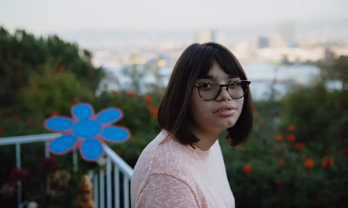 Image of Lena Deacy outside on a balcony
