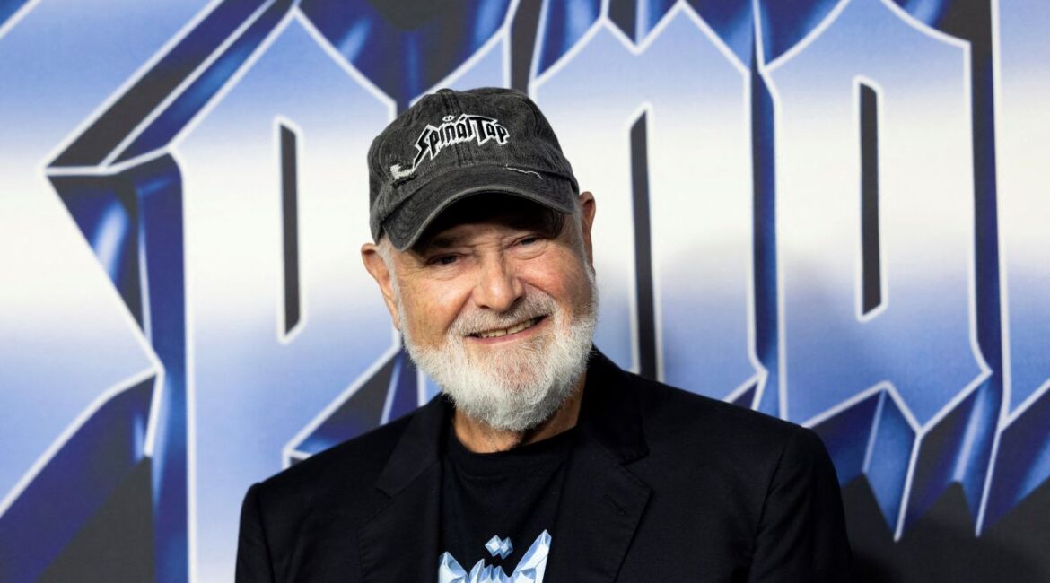 Image of Rob Reiner, who is wearing a dark sport jacket and a baseball cap