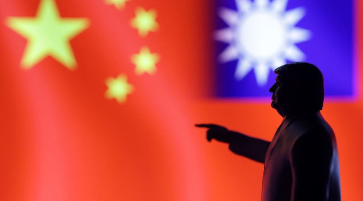 A 3D-printed miniature model depicting U.S. President Donald Trump, Chinese flag and fragment of Taiwanese flag in this illustration taken, April 17, 2025. (Reuters/Dado Ruvic/Illustration)