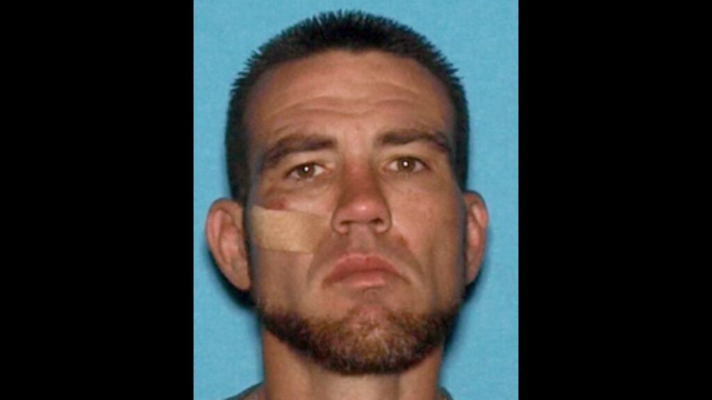 A Fresno police officer was shot at during a struggle with a wanted felon, identified as Bradley Nicolson (pictured), Sunday evening, prompting officers to return fire and critically injure the suspect, authorities said. (Fresno PD)