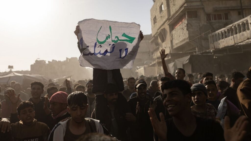 A Palestinian protestor holds up a sign reading "Hamas does not represent us," during a demonstration against the group in Beit Lahiya, Gaza Strip, March 26, 2025. A cease-fire after two years of war with Israel has allowed Hamas to tighten its grip on power again. “It’s still standing,” one Israeli official said. (Saher Alghorra/The New York Times)..