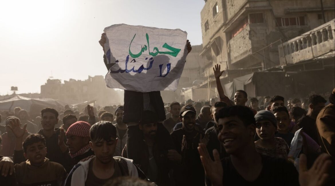 A Palestinian protestor holds up a sign reading "Hamas does not represent us," during a demonstration against the group in Beit Lahiya, Gaza Strip, March 26, 2025. A cease-fire after two years of war with Israel has allowed Hamas to tighten its grip on power again. “It’s still standing,” one Israeli official said. (Saher Alghorra/The New York Times)..