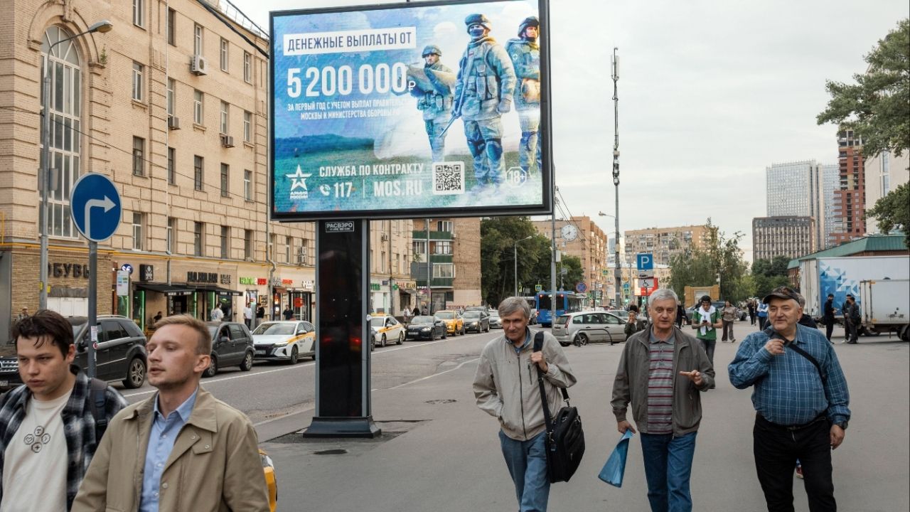A military recruitment billboard touting enlistment bonuses in Moscow, June 25, 2025. What could make the Kremlin actually want peace? Economic and military pressures could force Russia’s hand. Its economy is strained — but not enough to do that, analysts say. And President Vladimir Putin says Russia is winning the war. (Nanna Heitmann/The New York Times)