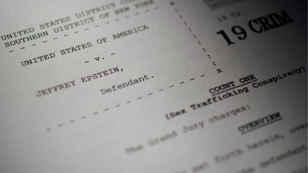 A newly-released unsealed indictment of disgraced late financier and sex offender Jeffrey Epstein is seen in this handout image released by the U.S. Justice Department and printed and arranged for a photograph by Reuters in Washington, D.C., U.S., December 19, 2025. (Reuters/Jonathan Ernst)