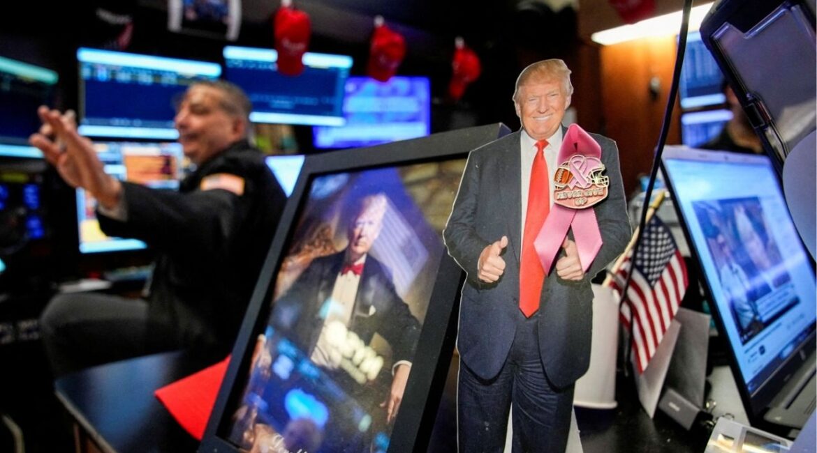 A picture of U.S. President Donald Trump as traders work on the floor at the New York Stock Exchange (NYSE) in New York City, U.S., December 2, 2025. (Reuters File)