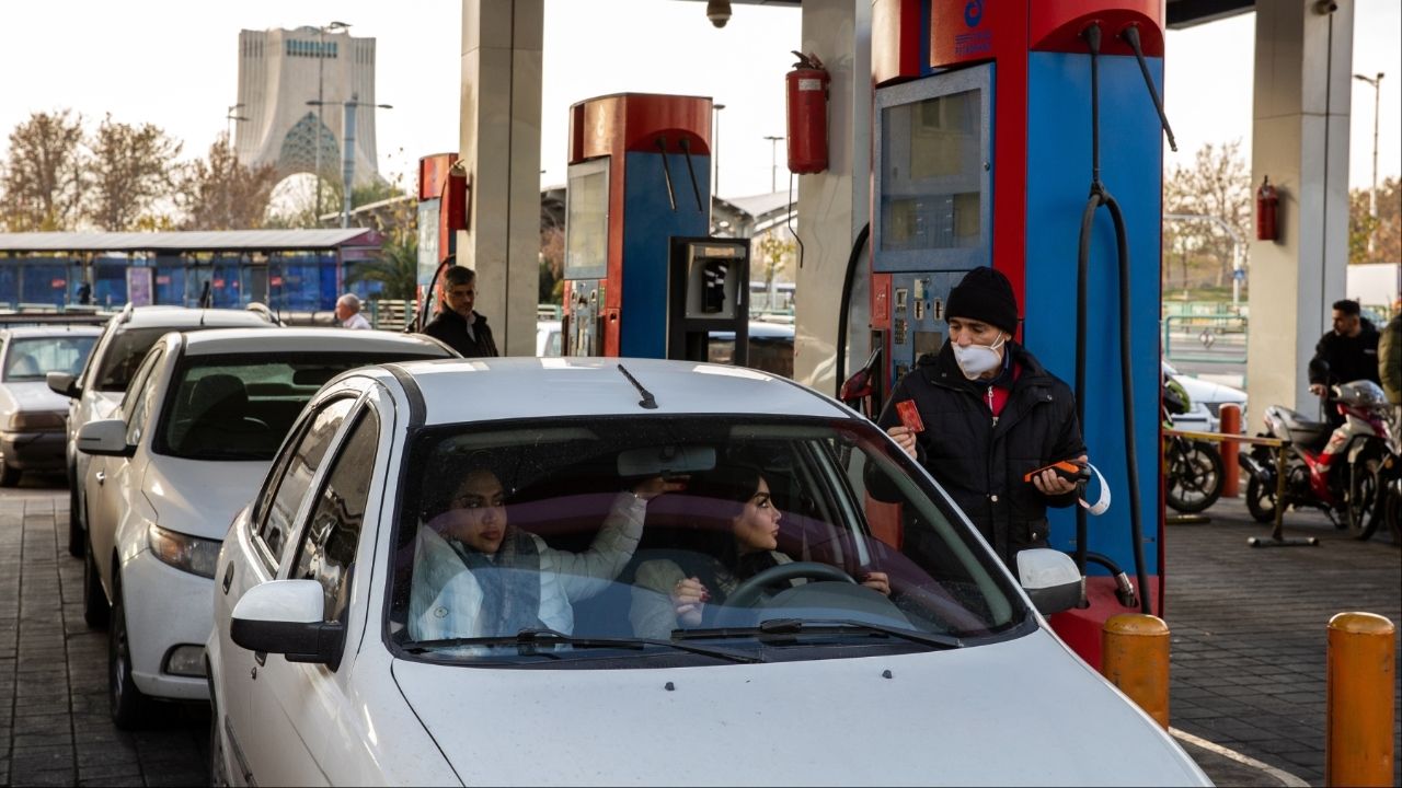 An attendant takes a customer’s credit card for payment at a gas station in the capital of Tehran, Iran, Dec. 13, 2025. Protesters took to the streets in the capital and other cities in Iran on Monday, Dec. 29, to decry surging inflation and the collapse of the national currency, which have thrown markets into chaos and punched holes in family budgets. (Arash Khamooshi/The New York Times)
