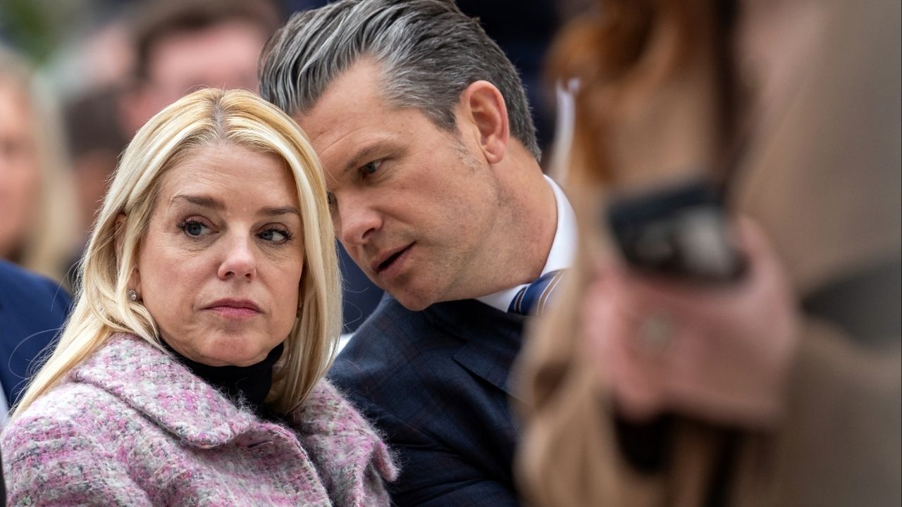 Attorney General Pam Bondi and Defense Secretary Pete Hegseth at an event in the Rose Garden on the White House on Nov. 25, 2025. As a lawyer for a conservative think tank, Bondi filed a Supreme Court brief last year saying service members who followed unlawful orders were committing crimes. (Eric Lee/The New York Times)