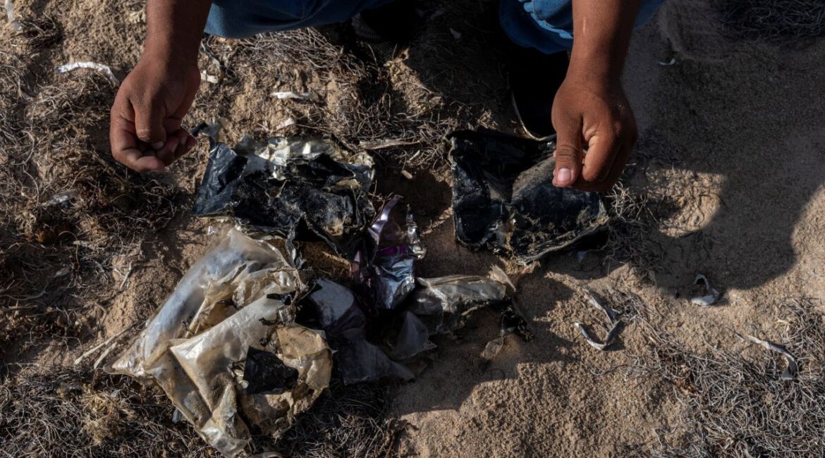 Image of what appears to be a burned life jacket and packets containing traces of marijuana