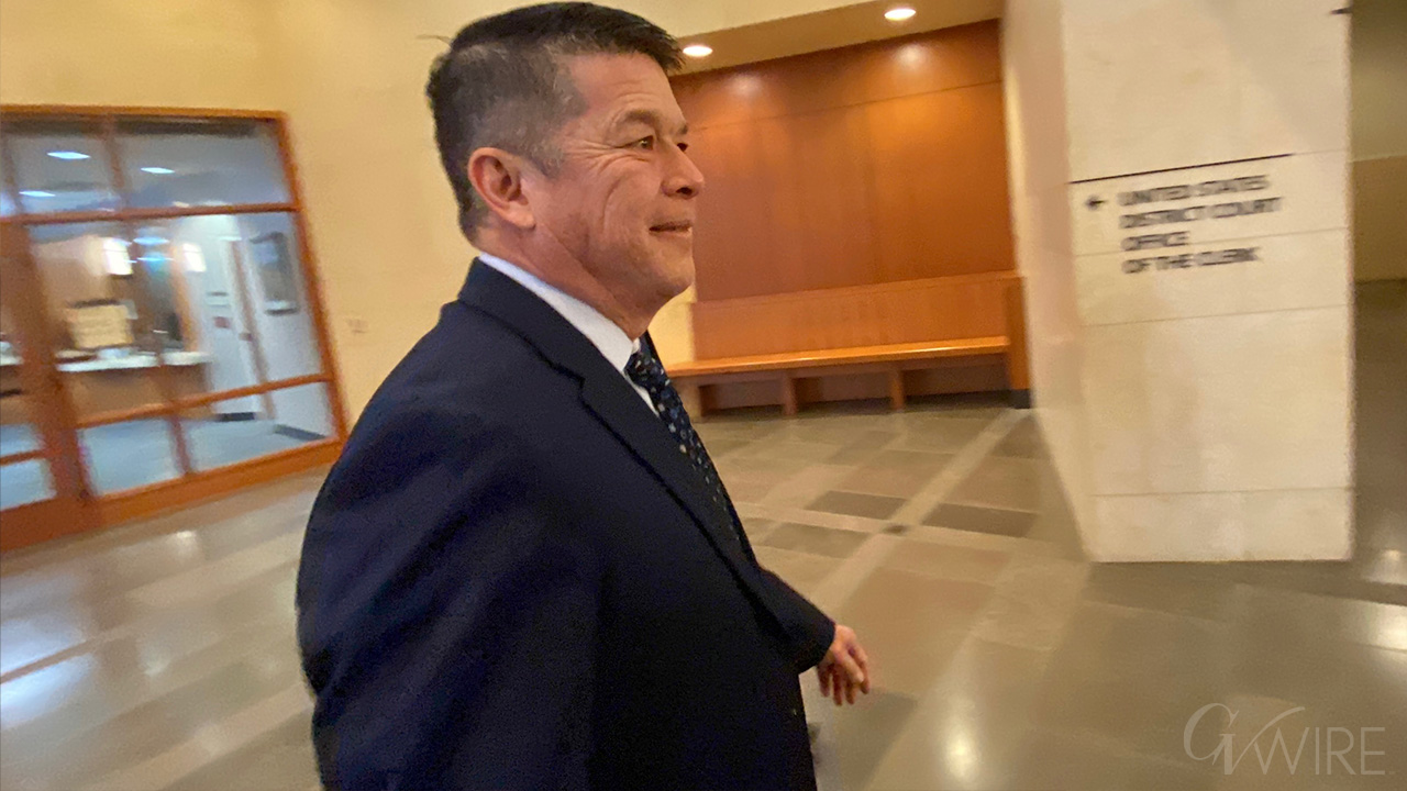 Cox enters the federal courthouse ahead of sentencing hearing