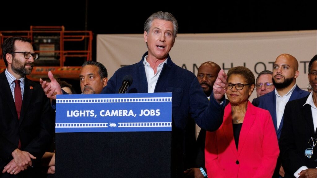 California Governor Gavin Newsom speaks next to Los Angeles Mayor Karen Bass as he announces a $750 million film and TV tax credit to help boost one of California's hallmark industries and the local economy from The Ranch, a Warner Bros. production facility, in Burbank, California, U.S., July 2, 2025. (Reuters/Mike Blake)