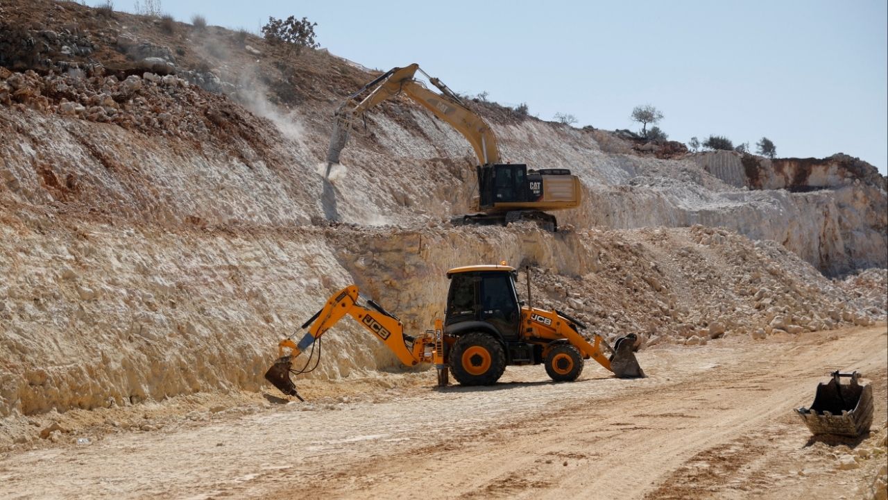 Excavators expand an Israeli bypass road connecting Israeli settlers in the Israeli-occupied West Bank with Jerusalem, near Ramallah in the West Bank, September 29, 2025. (Reuters File)