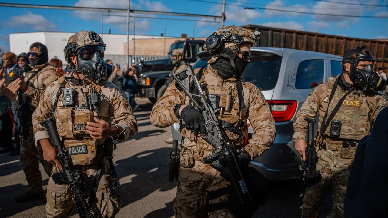 Federal agents during a confrontation with residents in the Little Village neighborhood of Chicago, Oct. 23, 2025. Immigration and Customs Enforcement told a nonprofit watchdog that it had found “no records” of body camera footage produced during its sweeping immigration enforcement operation in Chicago, raising concerns that it was skirting laws intended to ensure transparency and accountability. (Jamie Kelter Davis/The New York Times)