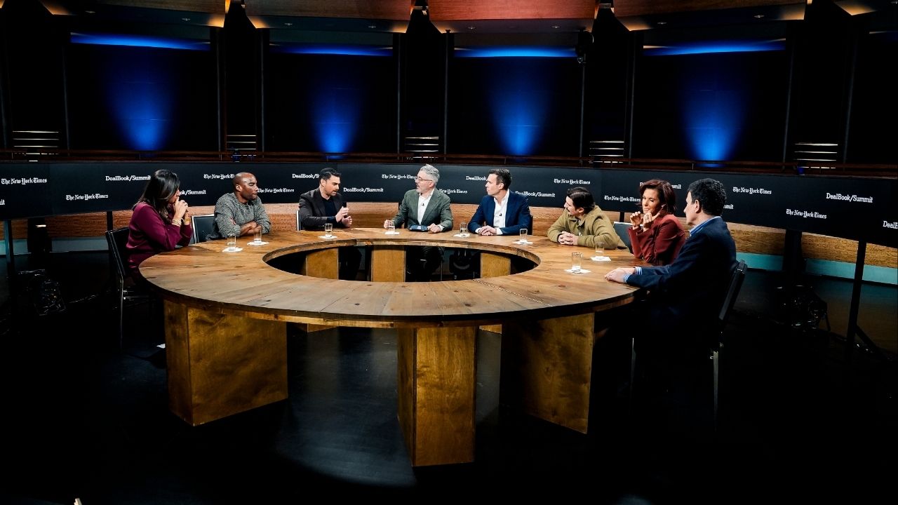 From left, Amna Nawaz, Charlamagne tha God, Ben Shapiro, the moderator Michael Barbaro, Jon Favreau, Andrew Schulz, Stephanie Ruhle and David Remnick during a DealBook task force panel about trust and the media in New York, on Wednesday, Dec. 3, 2025. Legacy journalists on a DealBook Summit panel warned about interference from President Trump, while panelists from new media said he is just the “coroner” for a field that had already lost credibility. (Nicole Craine/The New York Times)
