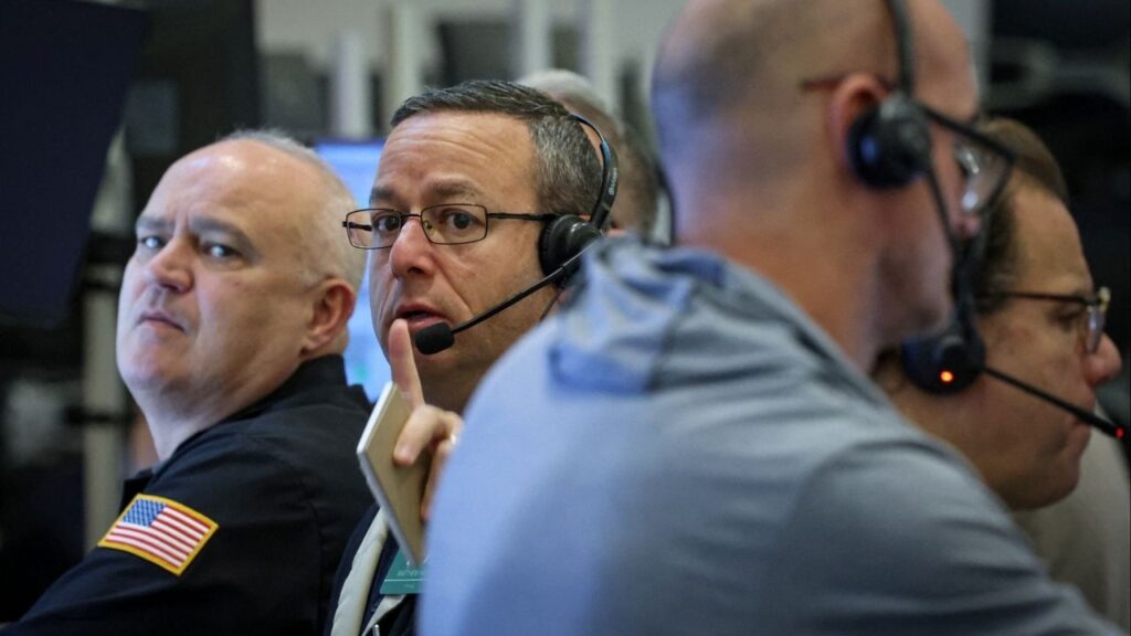 Futures-options traders work on the floor at the New York Stock Exchange's NYSE American (AMEX) in New York City, U.S., December 15, 2025. (Reuters/Brendan McDermid)