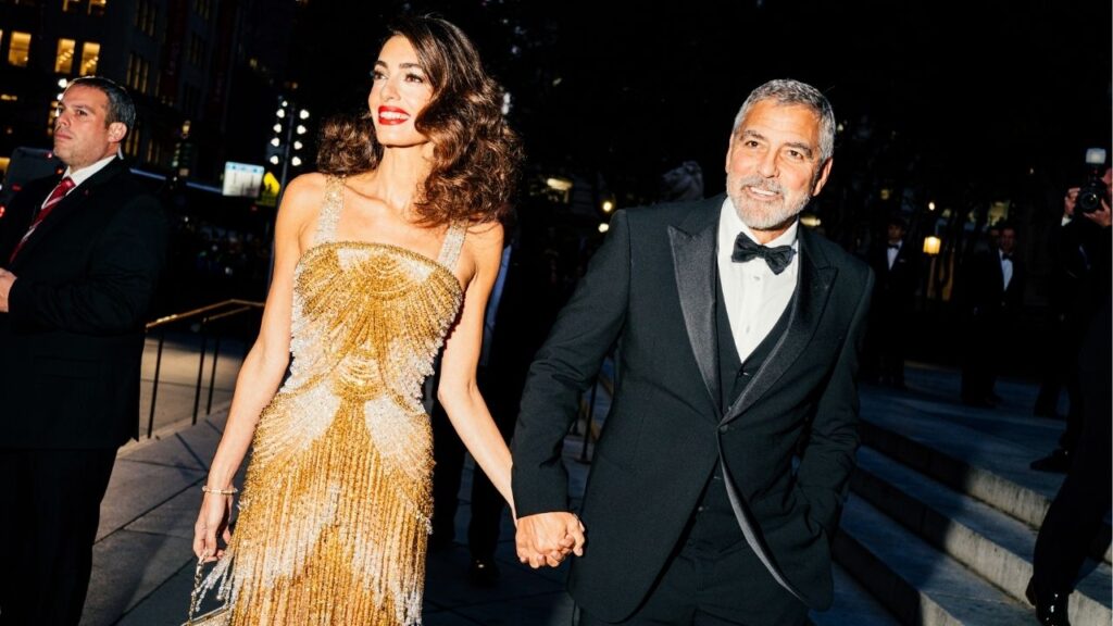 George Clooney and his wife, Amal Clooney, left, at the Clooney Foundation For Justice Inaugural Albie Awards in New York, Sept. 29, 2022. France has granted citizenship to Hollywood star George Clooney and his wife, a human rights lawyer, according to government decrees issued over the weekend. (Jutharat Pinyodoonyachet/The New York Times)