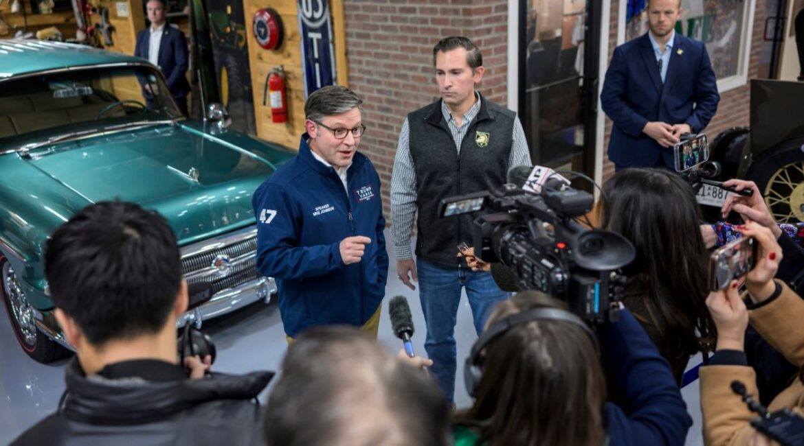 House Speaker Mike Johnson (R-La.), left, with Matt Van Epps, a Republican candidate in a House special election, in Franklin, Tenn., on Monday, Dec. 1, 2025. Johnson put President Donald Trump on speakerphone during the Monday event, underscoring the unusual amount of national attention on a House special election. (William DeShazer/The New York Times)