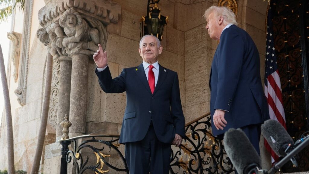 Israeli Prime Minister Benjamin Netanyahu gestures as he is welcomed by U.S. President Donald Trump for meetings at the Mar-a-Lago club in Palm Beach, Florida, U.S., December 29, 2025. (Reuters/Jonathan Ernst)