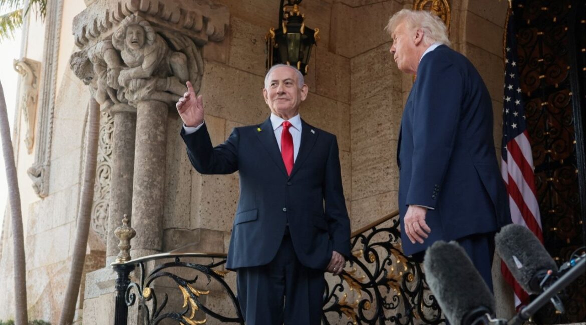 Israeli Prime Minister Benjamin Netanyahu gestures as he is welcomed by U.S. President Donald Trump for meetings at the Mar-a-Lago club in Palm Beach, Florida, U.S., December 29, 2025. (Reuters/Jonathan Ernst)