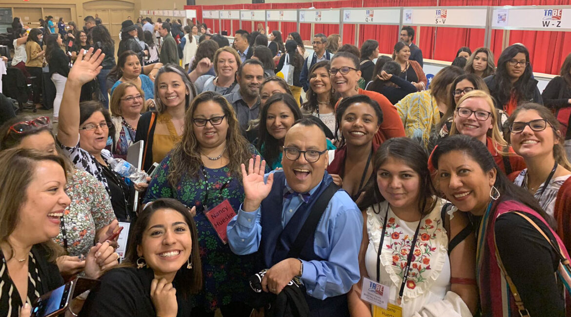 José Medina poses with educators at the Texas Association for Bilingual Education conference