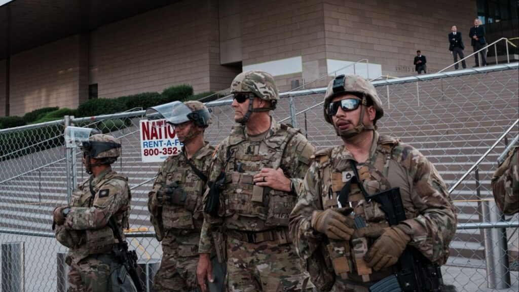 Members of the California National Guard deployed outside a federal courthouse in Los Angeles, on June 14, 2025. A federal judge ordered the Trump administration on Dec. 10 to immediately end its deployment of California National Guard troops in Los Angeles, ruling that the federal government had illegally kept them in the city long after intense street protests had ended in the summer. (Gabriela Bhaskar/The New York Times)