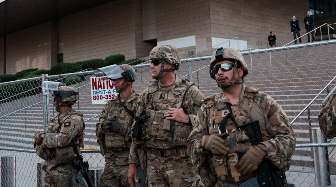 Members of the California National Guard deployed outside a federal courthouse in Los Angeles, on June 14, 2025. A federal judge ordered the Trump administration on Dec. 10 to immediately end its deployment of California National Guard troops in Los Angeles, ruling that the federal government had illegally kept them in the city long after intense street protests had ended in the summer. (Gabriela Bhaskar/The New York Times)