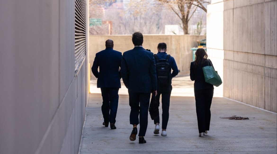 Members of the Department of Government Efficiency attempt to enter the U.S. Institutes of Peace in Washington, March 17, 2025. Elon Musk’s Department of Government Efficiency said it made more than 29,000 cuts to the federal government but the group did not do what Musk said it would: reduce federal spending by $1 trillion before October. On DOGE’s watch, federal spending did not go down at all. It went up. (Eric Lee/The New York Times) doge