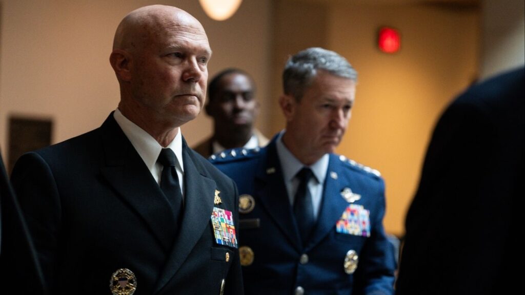 Navy Admiral Frank “Mitch” Bradley, left, accompanied by Chairman of the Joint Chiefs of Staff Air Force Gen. Dan Caine, right, arrives for a closed door classified meeting with lawmakers on Capitol Hill in Washington, Dec. 4, 2025. Top military officers will play for senior members of Congress a video of the Sept. 2 attack on a boat suspected of carrying drugs, including the follow-up strikes that have been at the center of a growing debate over the campaign. (Tierney L. Cross/The New York Times)