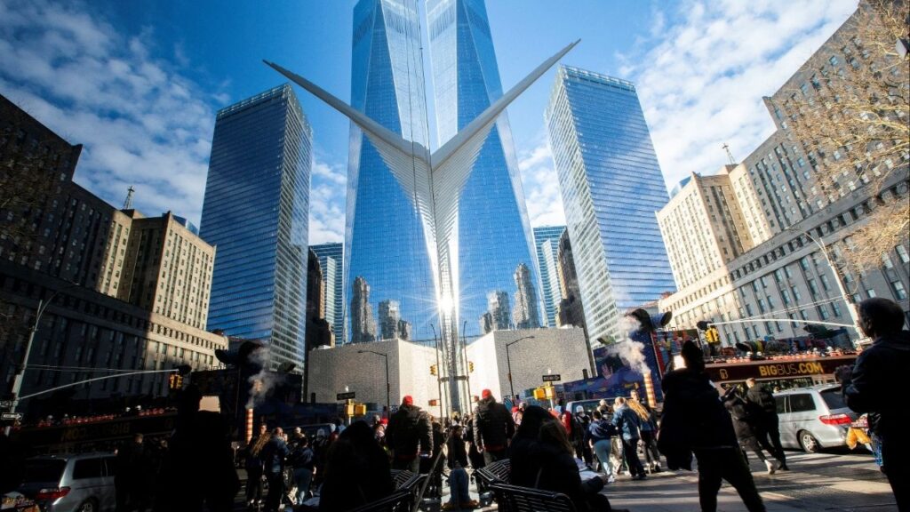 People walk around the Financial District near the New York Stock Exchange (NYSE) in New York, U.S., December 29, 2023. (Reuters/Eduardo Munoz)