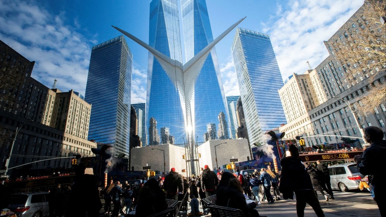 People walk around the Financial District near the New York Stock Exchange (NYSE) in New York, U.S., December 29, 2023. (Reuters/Eduardo Munoz)