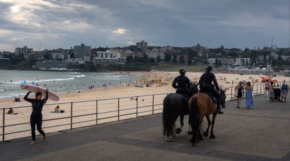 Police on horseback patrol Bondi Beach in Sydney, Australia, Dec. 21 2025. While new restrictions on firearms have broad support, new police powers to crack down on some protests were criticized as limits on civil liberties. (Matthew Abbott/The New York Times)