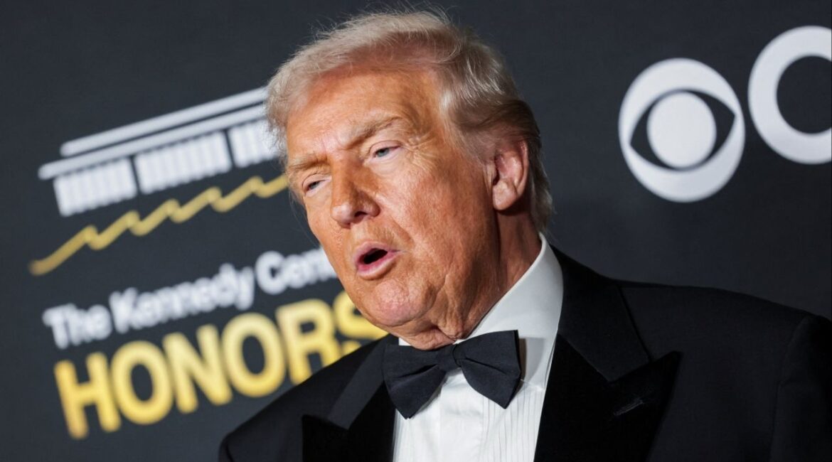 President Donald Trump poses on the red carpet for the 2025 Kennedy Center Honors at the John F. Kennedy Center for the Performing Arts in Washington, D.C., U.S., December 7, 2025. (Reuters/Jeenah Moon)