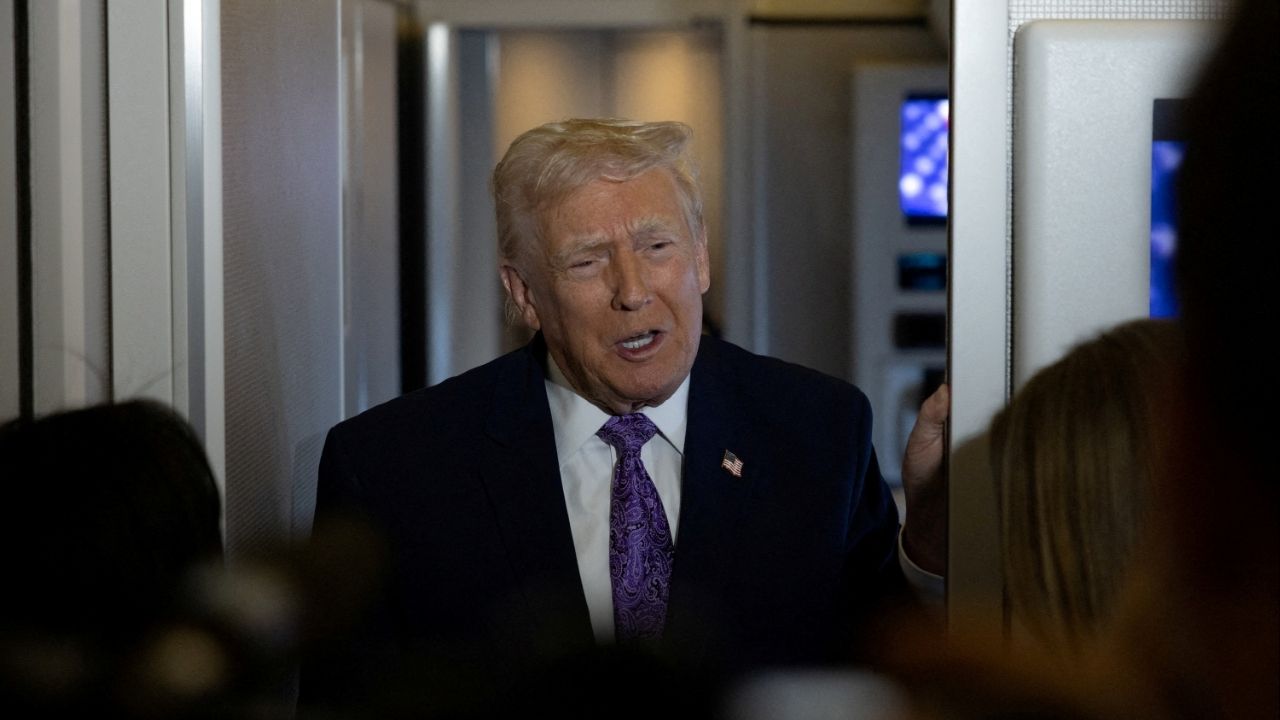 President Donald Trump speaks to reporters during travel to Washington, D.C., from Palm Beach International Airport, Florida, U.S., November 30, 2025. (Reuters/Anna Rose Layden)