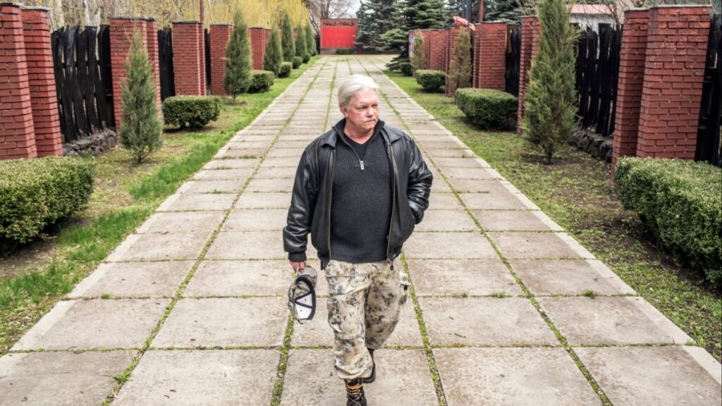 Russell Bonner Bentley III visits a memorial to victims of Nazi killings, in Donetsk, Ukraine, on April 11, 2017. A military court in a Russian-occupied region of Ukraine sentenced four soldiers on Monday, Dec. 8, 2025, to prison terms of up to 12 years for the gruesome murder of Bentley, a self-avowed American Communist from Texas who had spent a decade as a mercenary and propagandist for Moscow. (Brendan Hoffman via The New York Times