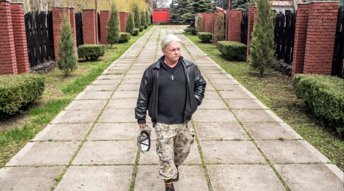 Russell Bonner Bentley III visits a memorial to victims of Nazi killings, in Donetsk, Ukraine, on April 11, 2017. A military court in a Russian-occupied region of Ukraine sentenced four soldiers on Monday, Dec. 8, 2025, to prison terms of up to 12 years for the gruesome murder of Bentley, a self-avowed American Communist from Texas who had spent a decade as a mercenary and propagandist for Moscow. (Brendan Hoffman via The New York Times