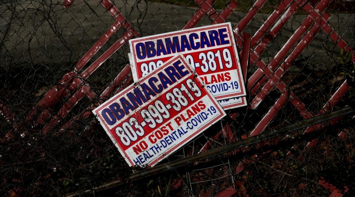 Signs for former Obamacare health insurance plans lay next to a fence in Columbia, South Carolina, U.S., January 28, 2023. (Reuters File)