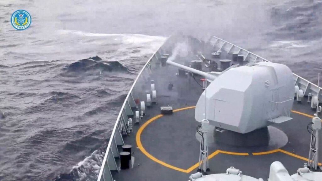 Smoke rises from a weapon on a ship after it was fired during drills east of Taiwan, in this screenshot from a video released by the Eastern Theatre Command of China's People's Liberation Army (PLA) on December 29, 2025. (Eastern Theatre Command/Handout via Reuters)