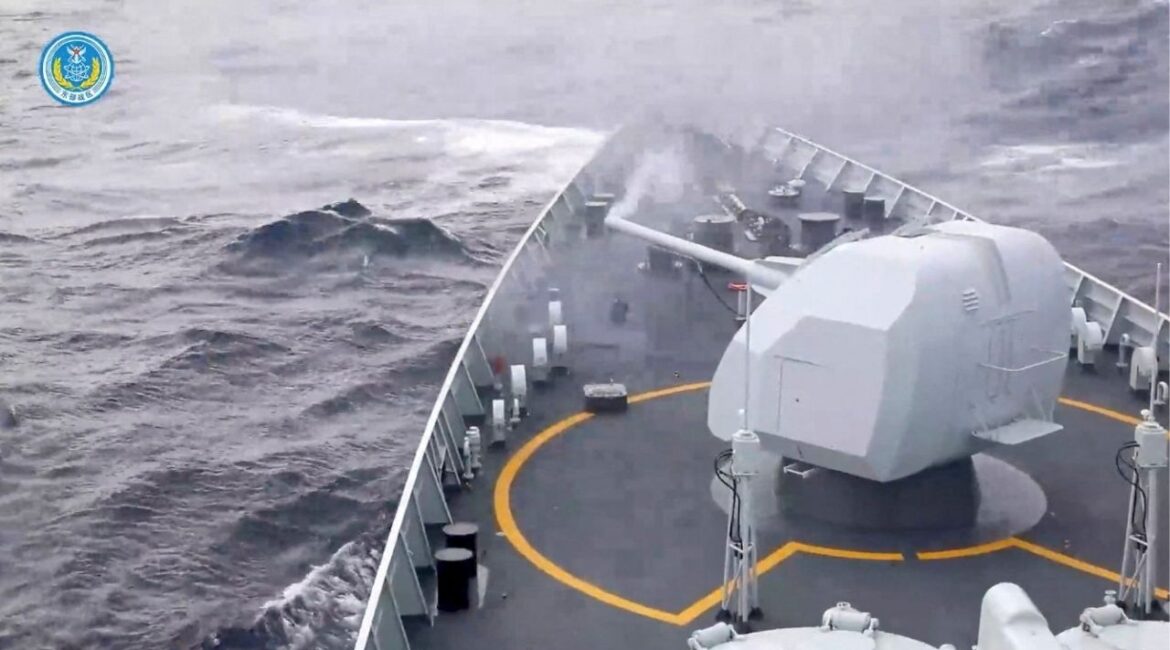 Smoke rises from a weapon on a ship after it was fired during drills east of Taiwan, in this screenshot from a video released by the Eastern Theatre Command of China's People's Liberation Army (PLA) on December 29, 2025. (Eastern Theatre Command/Handout via Reuters)