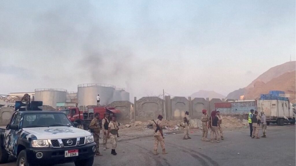 Smoke rises in the aftermath of a Saudi-led coalition airstrike, which targeted what it described as foreign military support to UAE-backed southern separatists, in Yemen's southern port of Mukalla, in this screengrab from a handout video obtained by Reuters on December 30, 2025. (SABAA TV/Handout via Reuters)