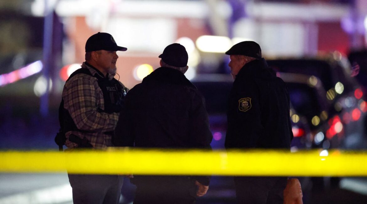 Image of Stockton police working the scene of a shooting in which four people died