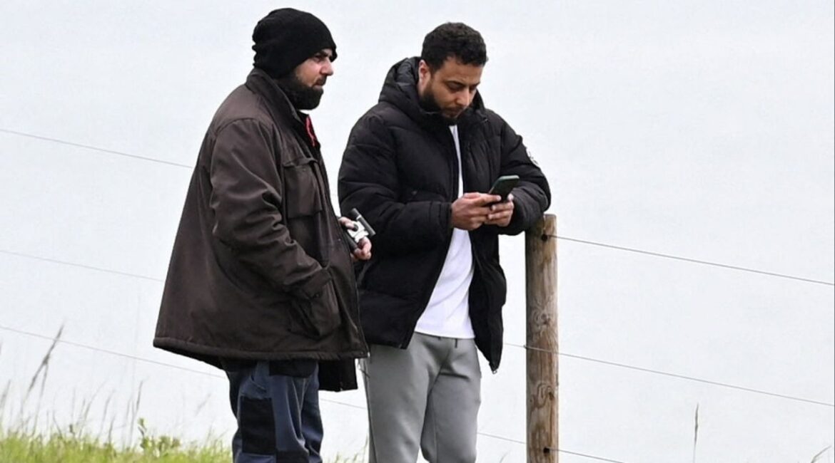 Surveillance image showing Walid Saadaoui, 38, and Amar Hussein, 52, pictured near Dover, as they have been found guilty at Preston Crown Court of plotting to kill hundreds in an Islamic State-inspired gun rampage against the Jewish community, in Britain, in this handout surveillance image dated May 8, 2025. Greater Manchester Police/Handout via REUTERS