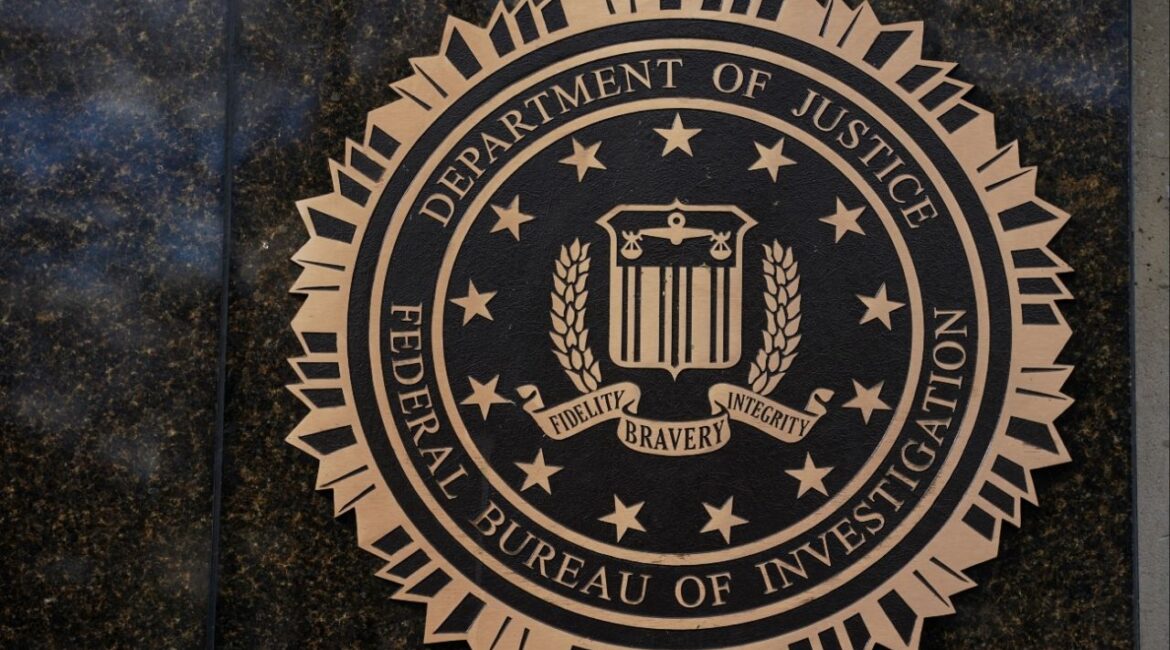 The logo of the Federal Bureau of Investigation (FBI) displayed on the building in Washington, D.C., U.S., November 28, 2025. (Reuters/Nathan Howard)